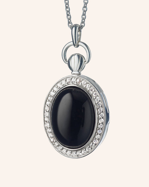 Sterling Silver Petite Oval Stone Locket with Center Black Onyx and White Sapphire Border