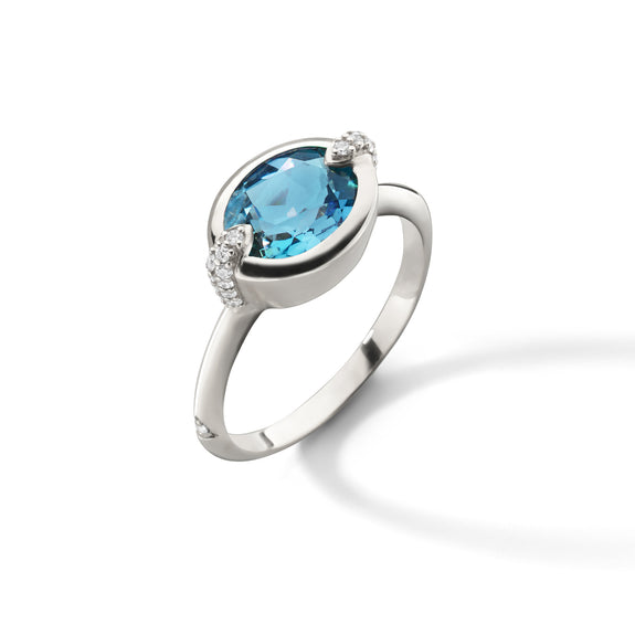 
  
    “Points North” Oval London Blue Topaz Ring with White Sapphires
  
