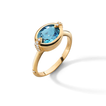 “Points North” Oval London Blue Topaz Ring with Diamonds