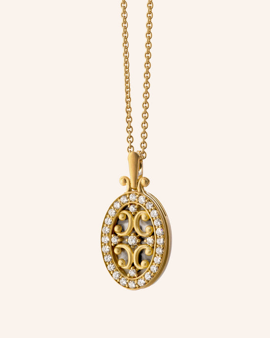 High Polish Oval Gate Locket with Diamond Border