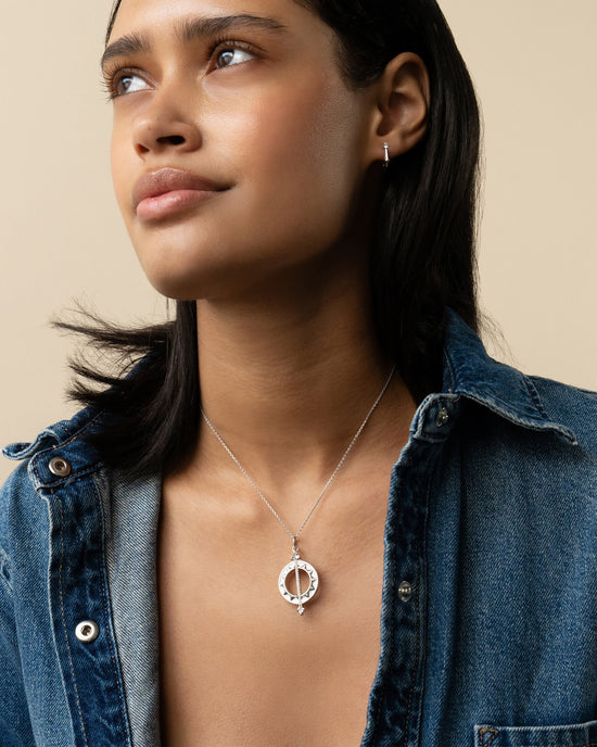 Sterling Silver White Enamel Sundial Charm - Time is Precious