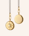 18k gold compass locket on steel chain