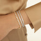 Luxe Graduated Round Bezel Set Diamond 18K White Gold Tennis Bracelet (middle)