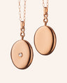 18k rose gold infinity locket with center diamond