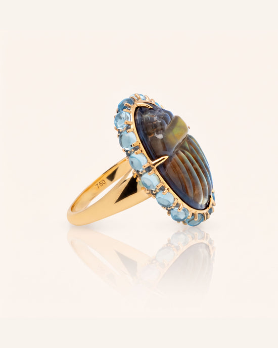 Special Edition Spectrolite Carved Scarab Ring with Sky Blue Topaz Cabochons and Blue Sapphires