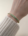 Special Edition Graduated Round Bezel Set Emerald 18K Gold Tennis Bracelet