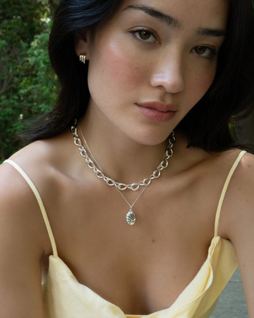 The Neptune Shell Two-Tone Locket Necklace and Premier Twist Infinity Chain