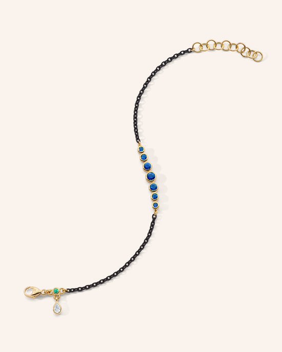 Bezel Set Round Blue Sapphire and Black Steel Tennis Bracelet
