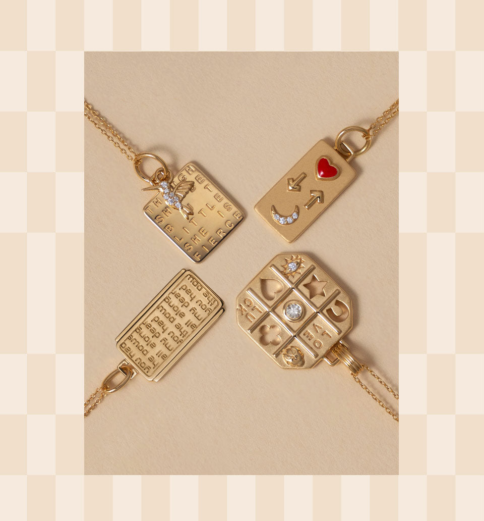 She is Fierce, Love you to the moon & back, Tokens of Luck, & Power Medallion necklaces in 18k gold.