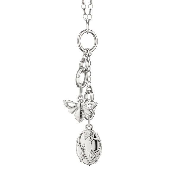
  
    The “Wisteria” Locket and “Bee” Sterling Silver Charm Necklace
  
