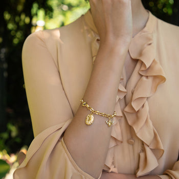 "Audrey" Charm Bracelet in 18K Yellow Gold with "Bee" Charm and "Wisteria" Locket