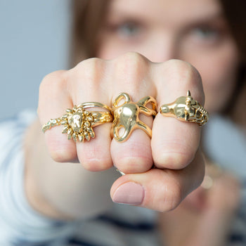"Intuition" Octopus Ring, "Courage" Lion Ring, and "Grace" Giraffe Ring